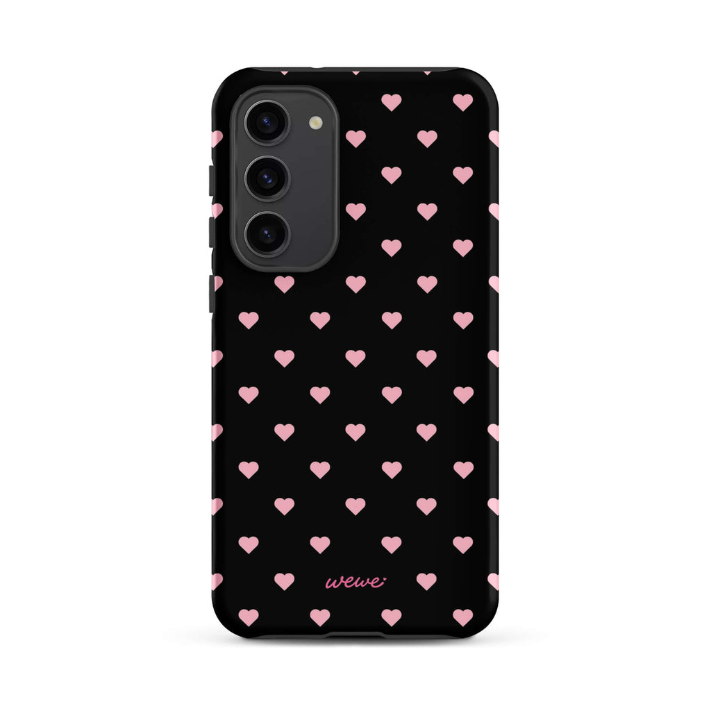 Black iPhone case with evenly spaced soft-pink mini hearts