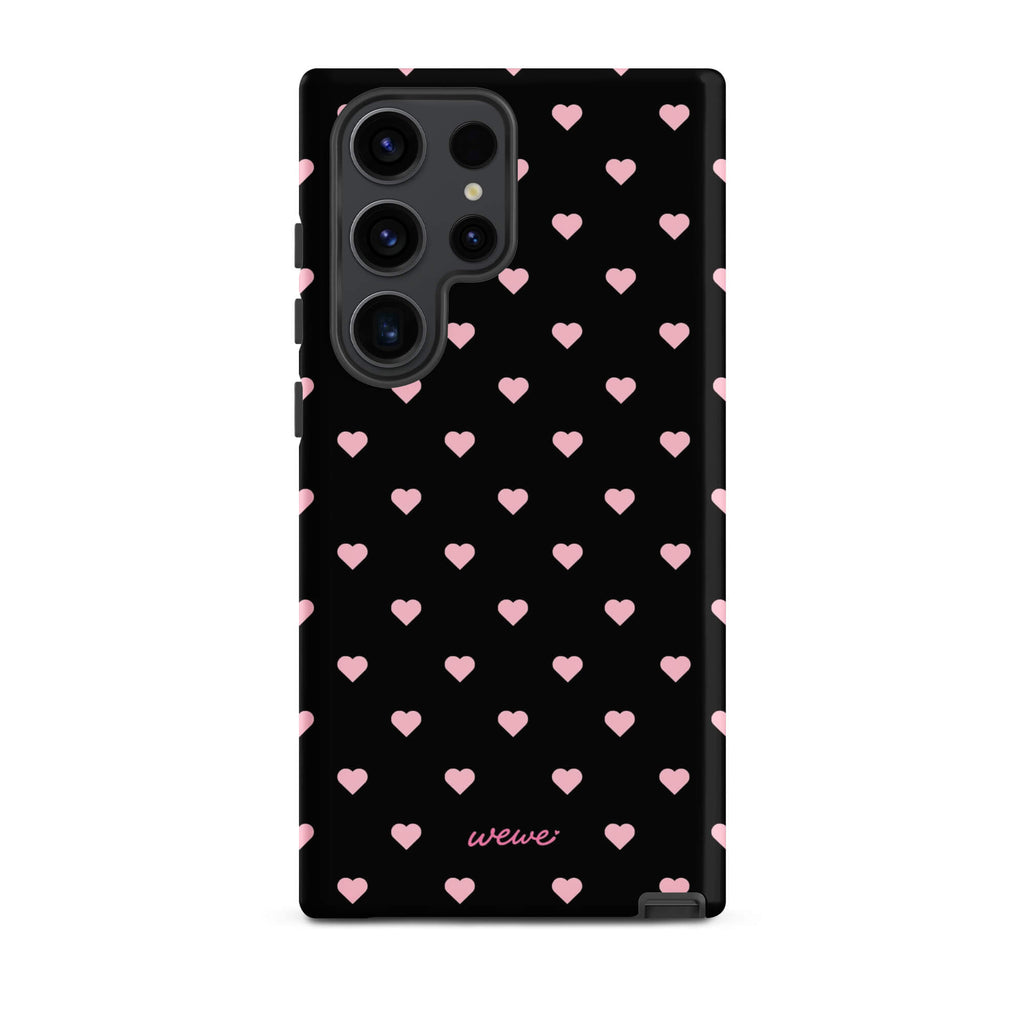Black iPhone case with evenly spaced soft-pink mini hearts
