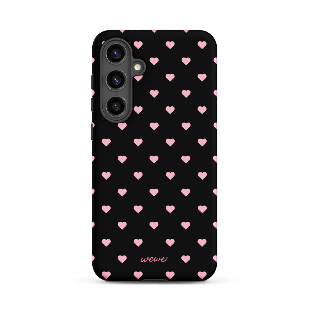 Black iPhone case with evenly spaced soft-pink mini hearts