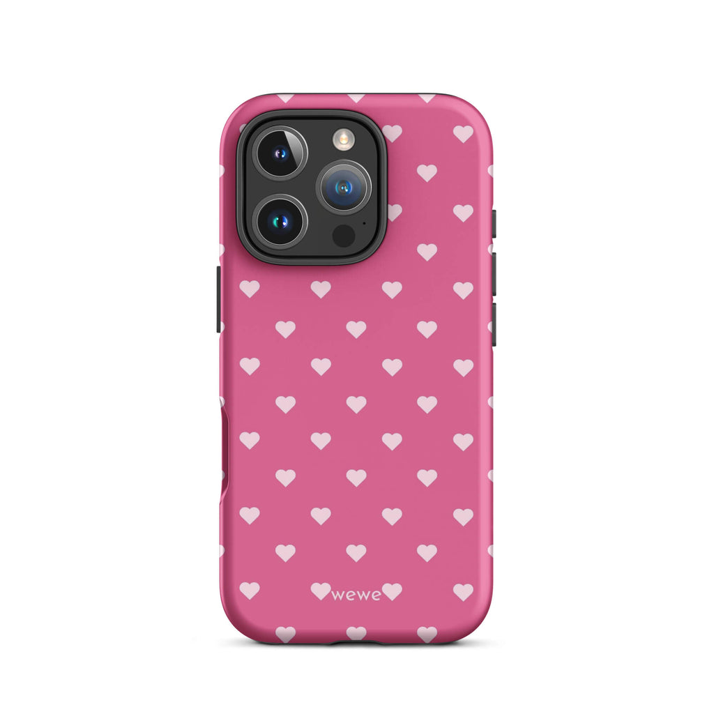 Bubblegum-pink iPhone case with evenly spaced pale blush-pink mini hearts