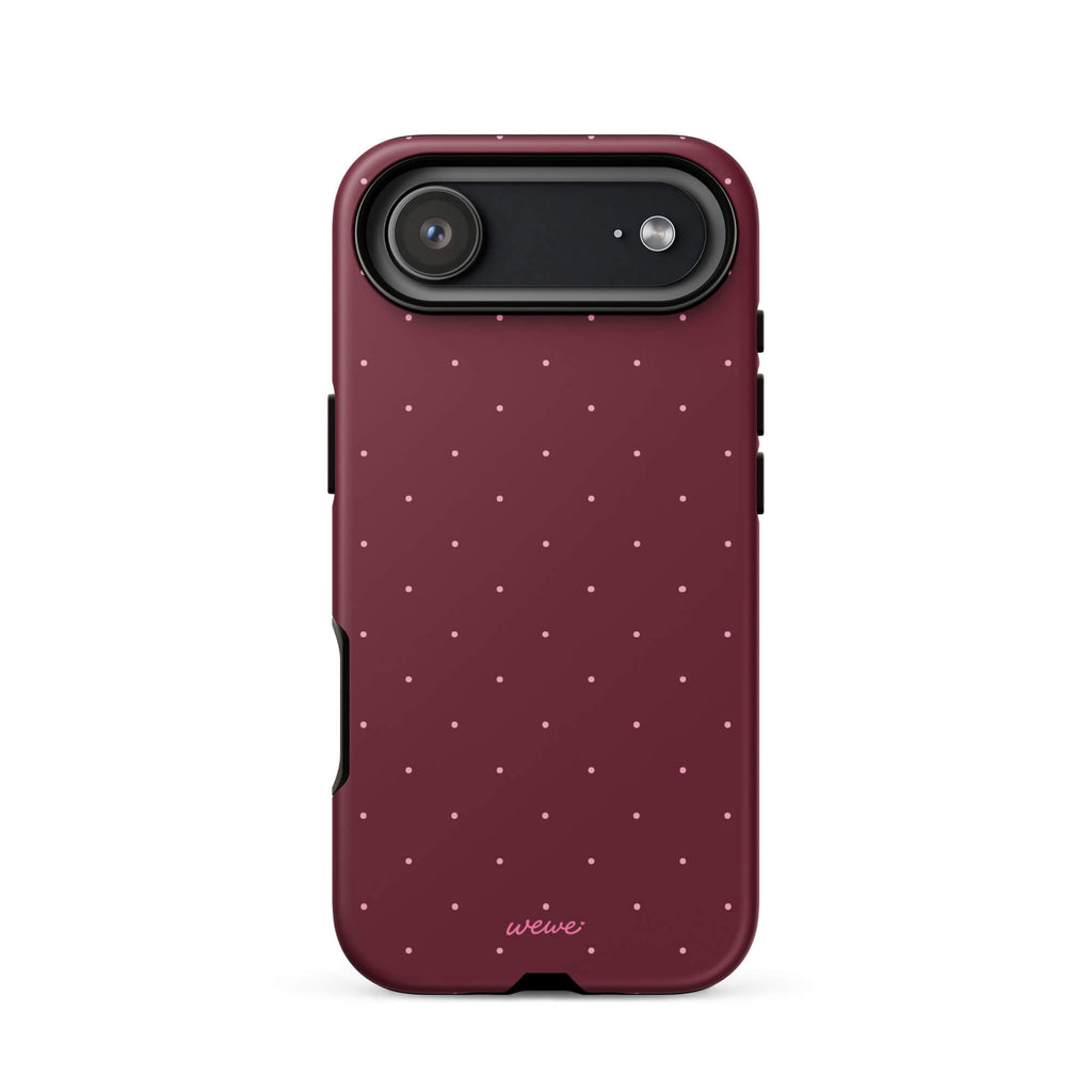 Deep burgundy iPhone case with evenly spaced tiny pale-pink micro dots