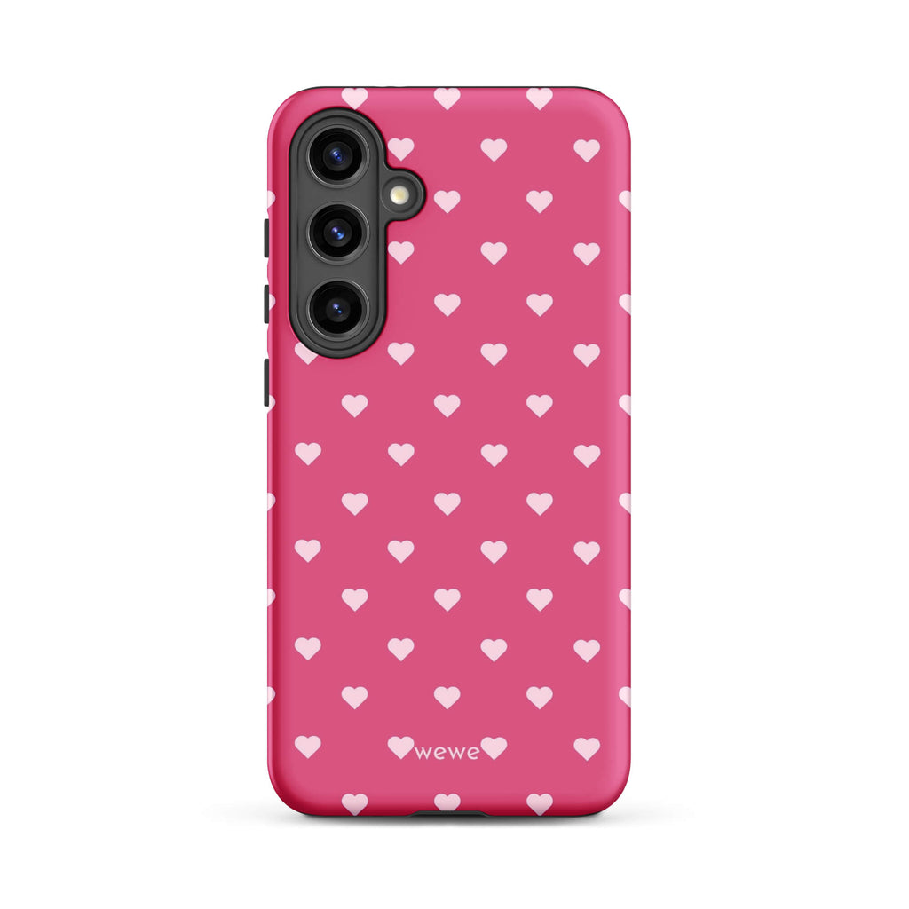 Bubblegum-pink iPhone case with evenly spaced pale blush-pink mini hearts