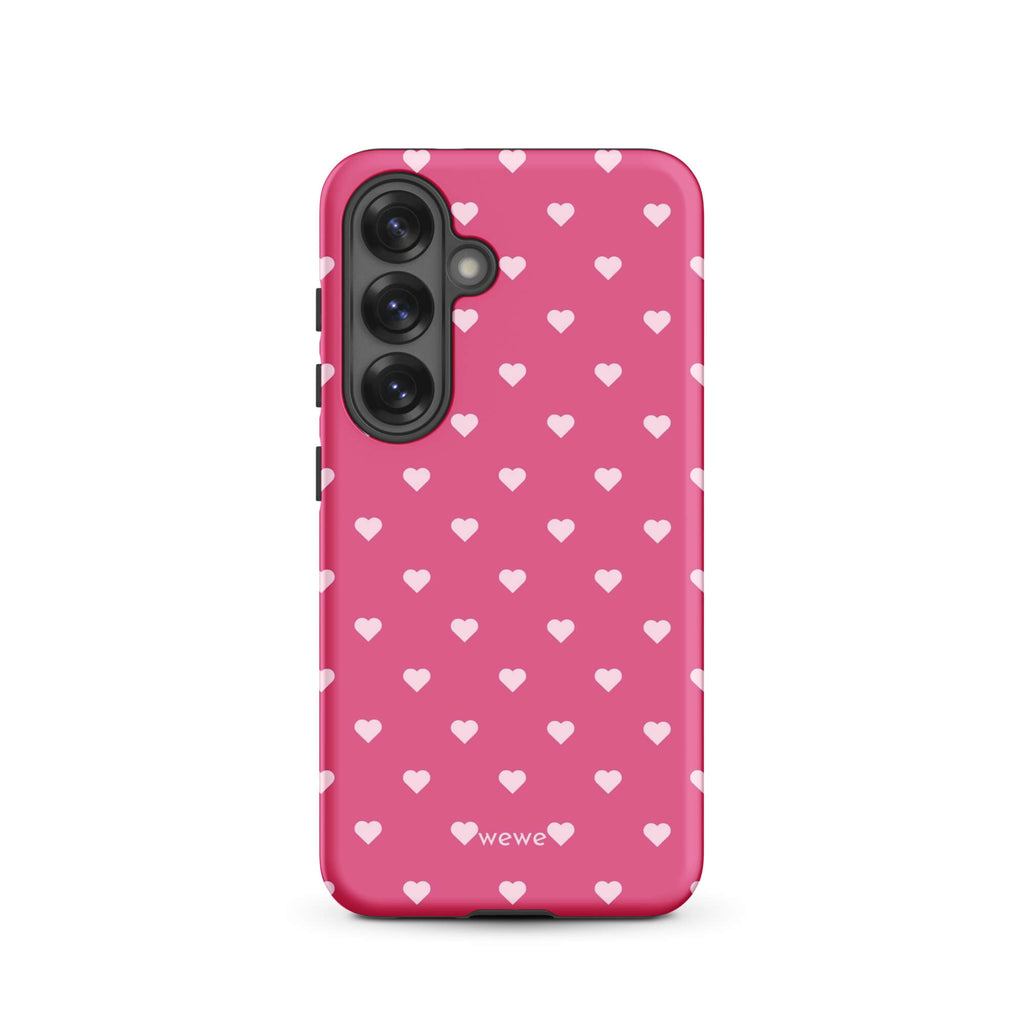 Bubblegum-pink iPhone case with evenly spaced pale blush-pink mini hearts