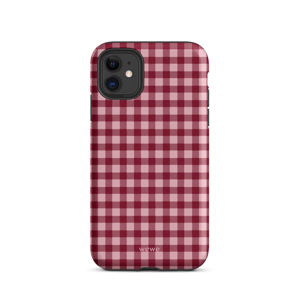 Deep burgundy and blush-pink iPhone case with an evenly repeated gingham check pattern