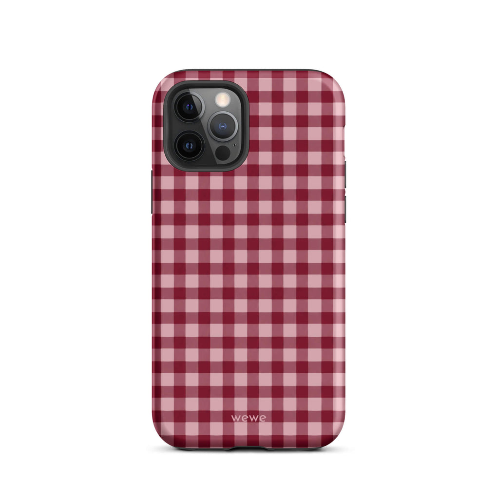 Deep burgundy and blush-pink iPhone case with an evenly repeated gingham check pattern