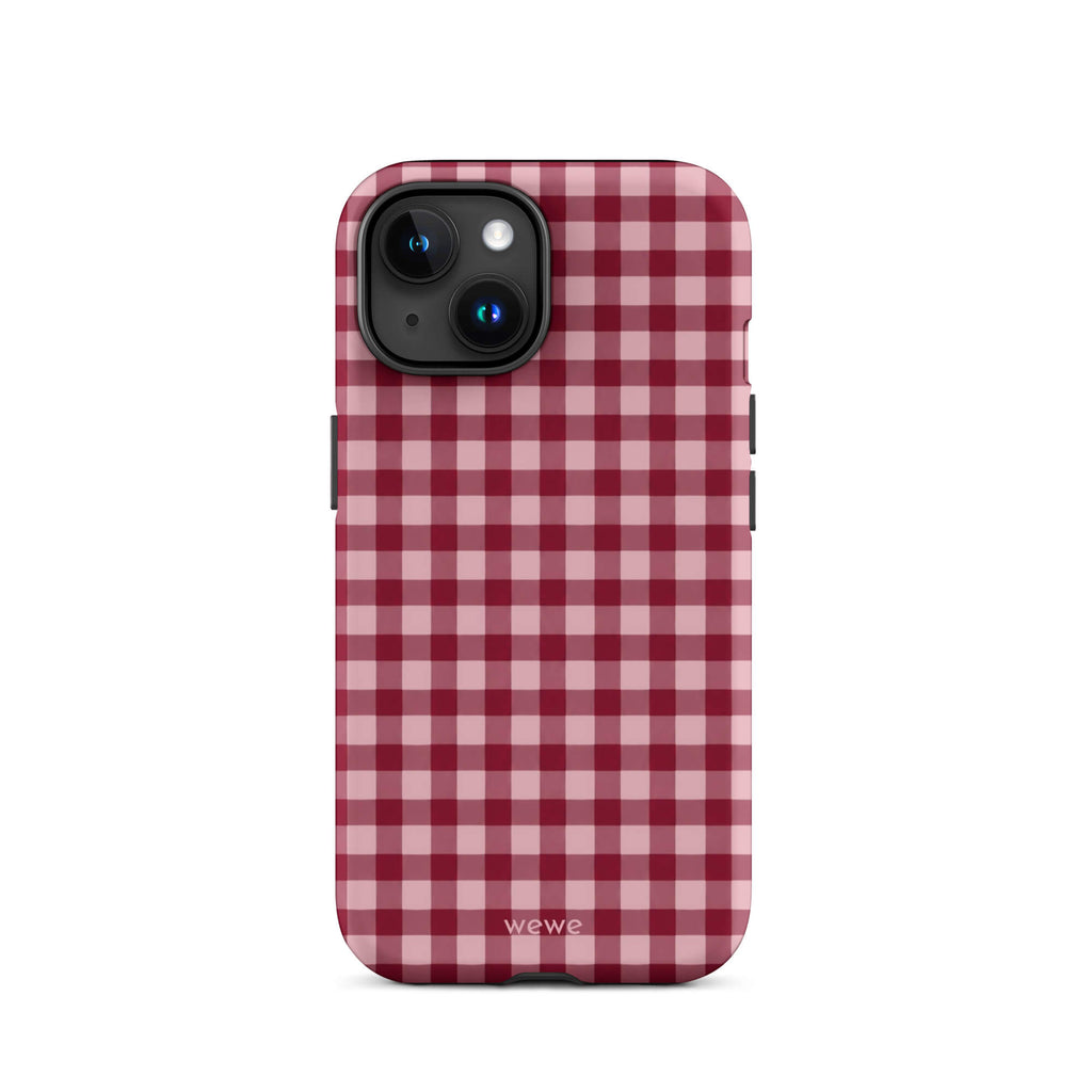 Deep burgundy and blush-pink iPhone case with an evenly repeated gingham check pattern
