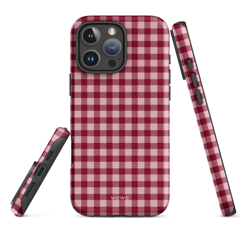 Deep burgundy and blush-pink iPhone case with an evenly repeated gingham check pattern