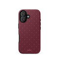 Deep burgundy iPhone case with evenly spaced tiny pale-pink micro dots