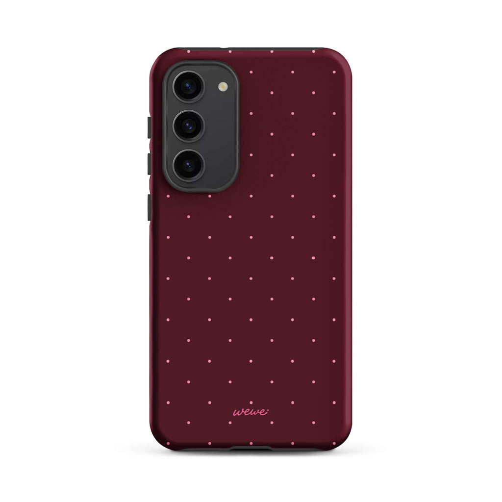 Deep burgundy iPhone case with evenly spaced tiny pale-pink micro dots