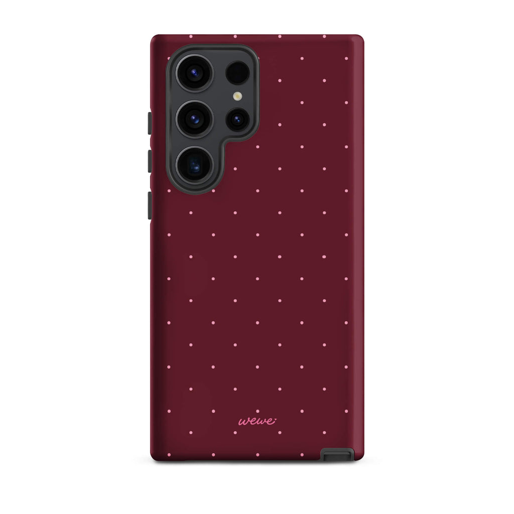 Deep burgundy iPhone case with evenly spaced tiny pale-pink micro dots