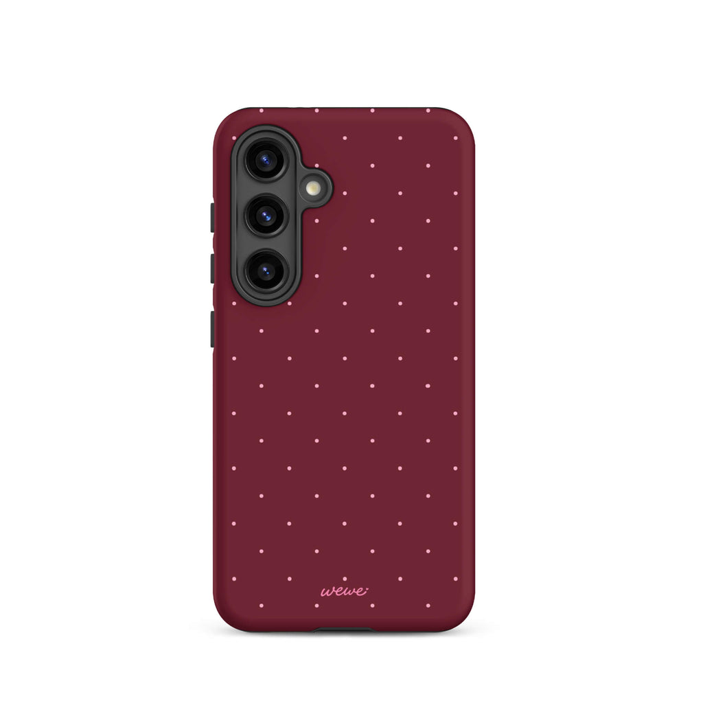 Deep burgundy iPhone case with evenly spaced tiny pale-pink micro dots