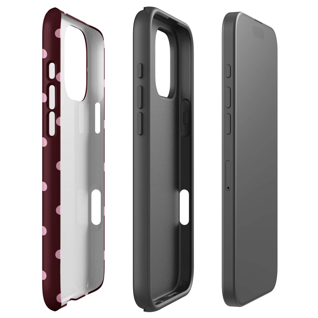 Deep burgundy iPhone case with evenly spaced soft-pink polka dots