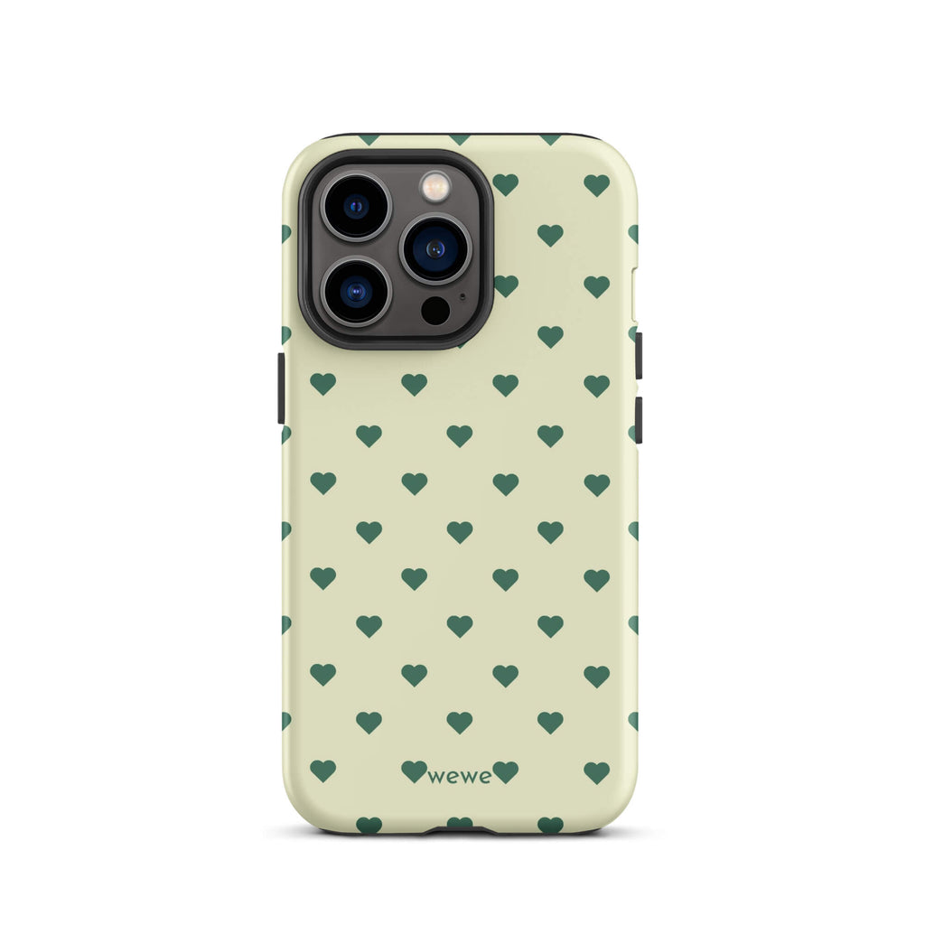 Pale buttercream iPhone case with evenly spaced forest-green mini hearts