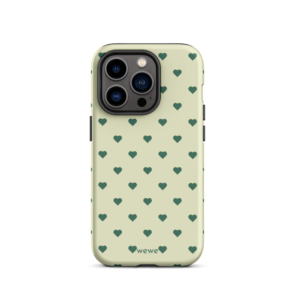 Pale buttercream iPhone case with evenly spaced forest-green mini hearts