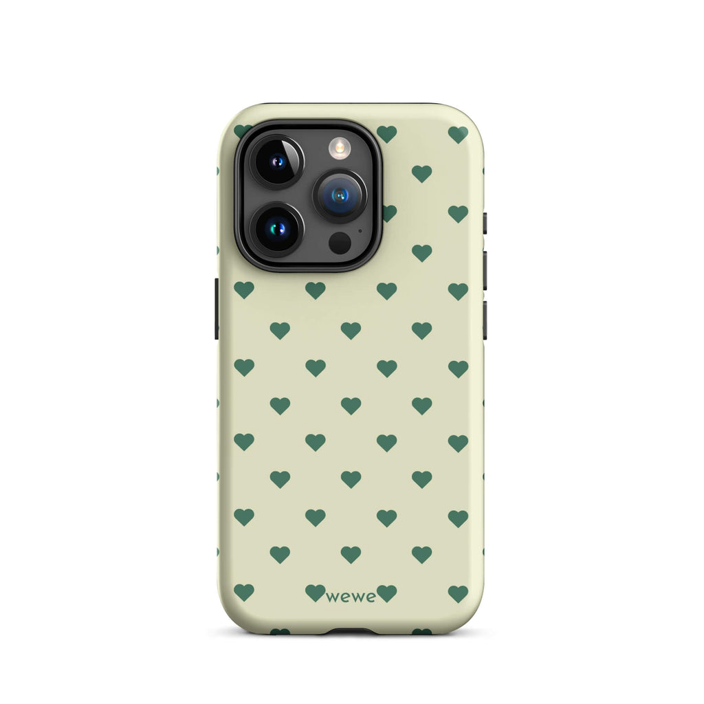 Pale buttercream iPhone case with evenly spaced forest-green mini hearts