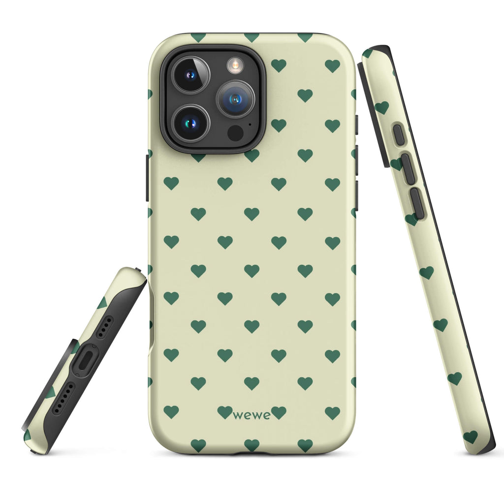 Pale buttercream iPhone case with evenly spaced forest-green mini hearts