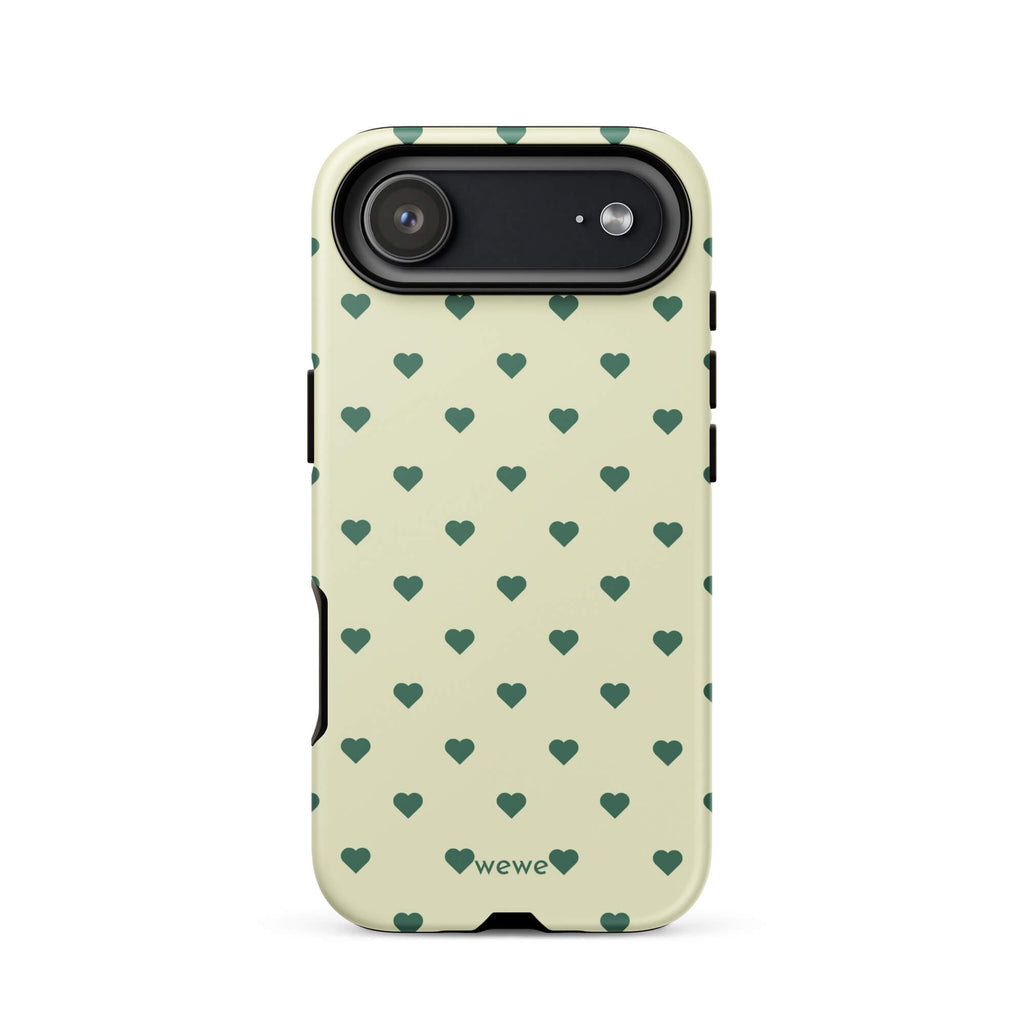 Pale buttercream iPhone case with evenly spaced forest-green mini hearts