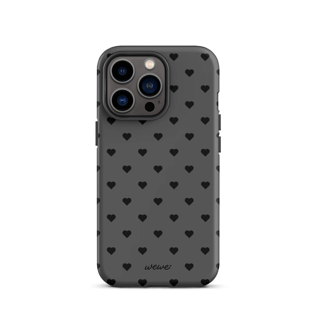 Charcoal-gray iPhone case with evenly spaced black mini hearts