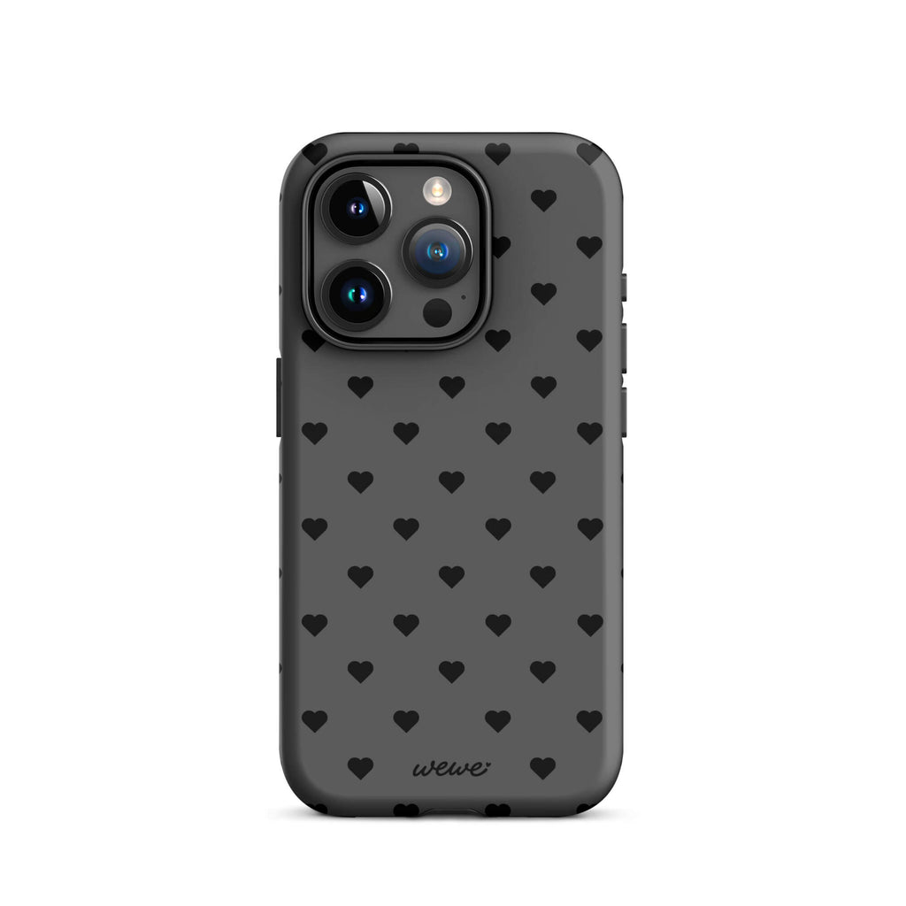 Charcoal-gray iPhone case with evenly spaced black mini hearts