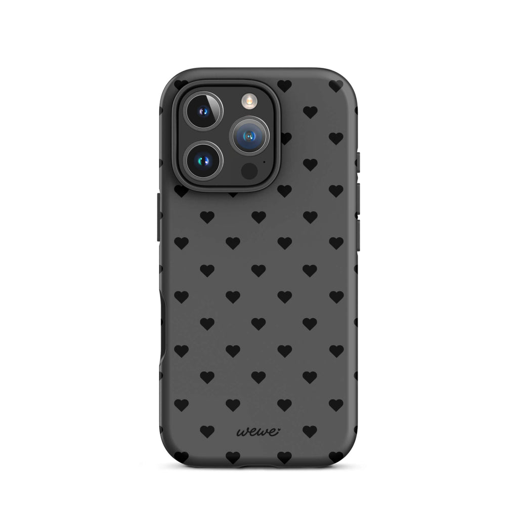 Charcoal-gray iPhone case with evenly spaced black mini hearts