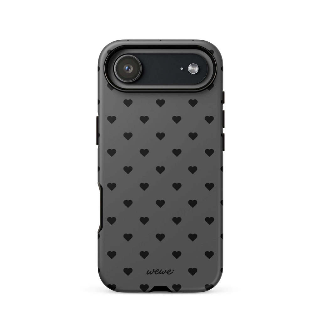 Charcoal-gray iPhone case with evenly spaced black mini hearts
