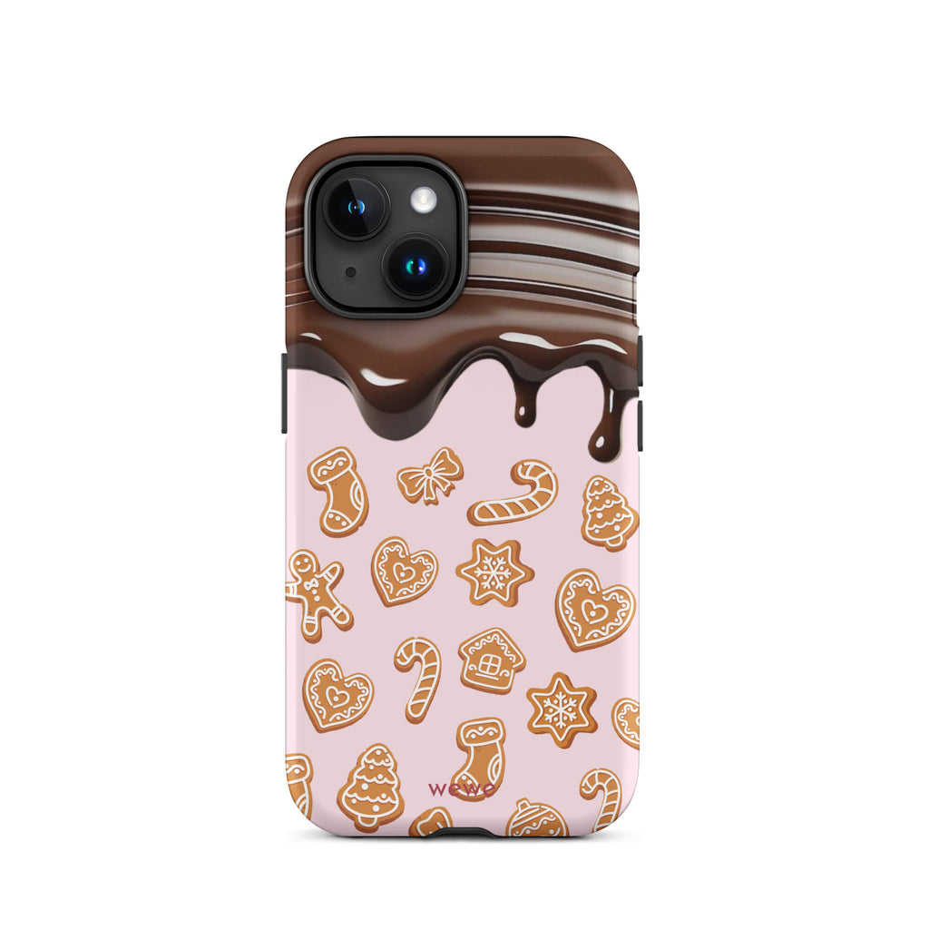 Custom iPhone 15 tough case featuring a top section resembling a melted chocolate bar dripping down onto a light pink background that is covered in a festive pattern of classic gingerbread cookies (gingerbread men, hearts, stars, candy canes, and trees), with 'wewe' branding at the bottom.