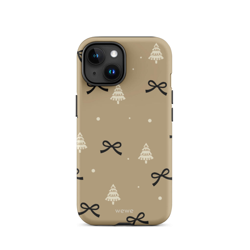 Custom iPhone 15 tough case in matte taupe/khaki brown featuring a scattered holiday pattern of small black bows, white doodle Christmas trees, and white snowflakes/dots, with 'wewe' branding at the bottom.