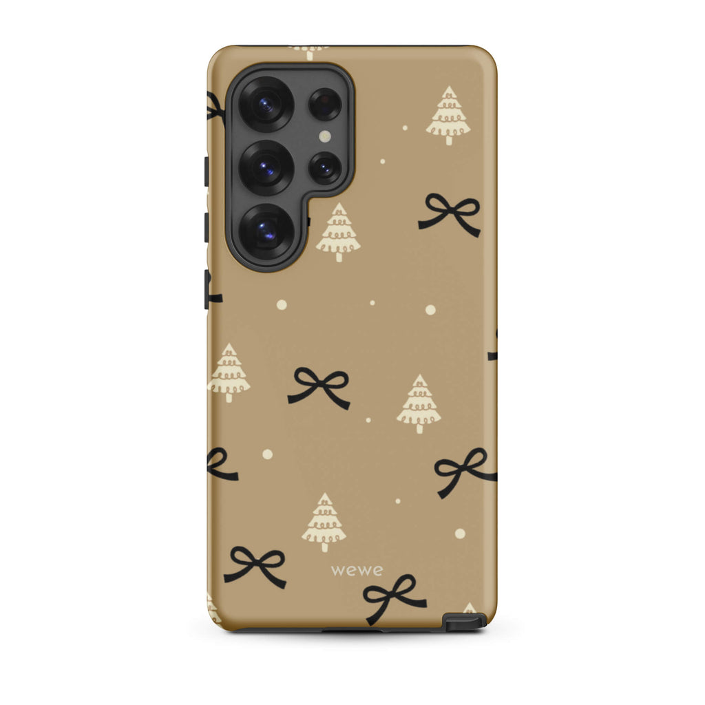 Custom samsung galaxy s25 ultra tough case in matte taupe/khaki brown featuring a scattered holiday pattern of small black bows, white doodle Christmas trees, and white snowflakes/dots, with 'wewe' branding at the bottom.