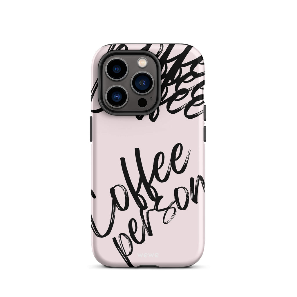 Custom iPhone case 14 pro with a light pink background and black brush script text that says 'Coffee Person'.
