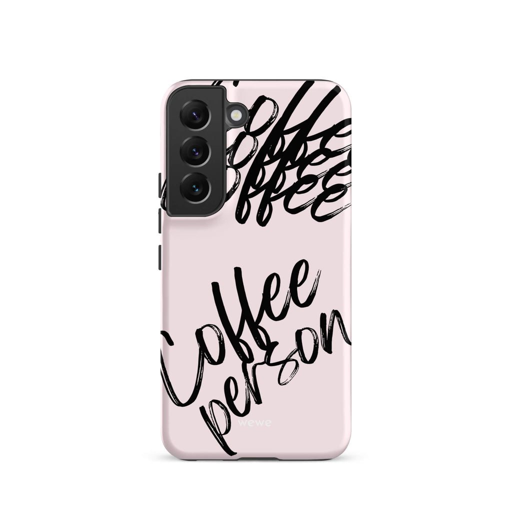 Custom samsung galaxy s22 Phone case with a light pink background and black brush script text that says 'Coffee Person'.