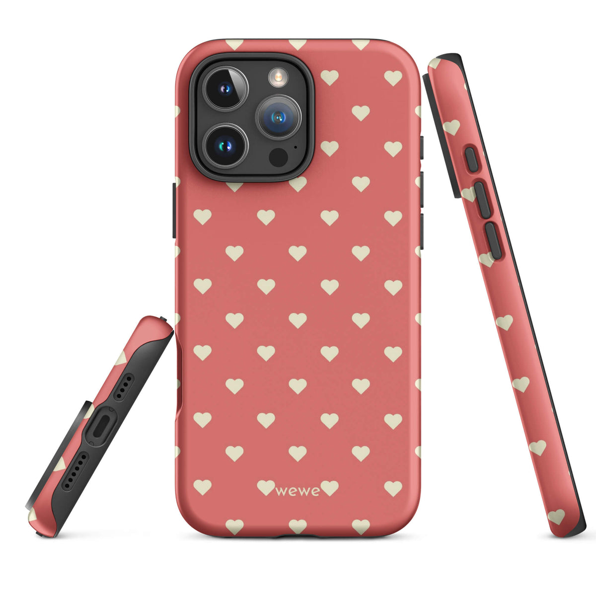 Coral-pink iPhone case with evenly spaced soft-cream mini hearts