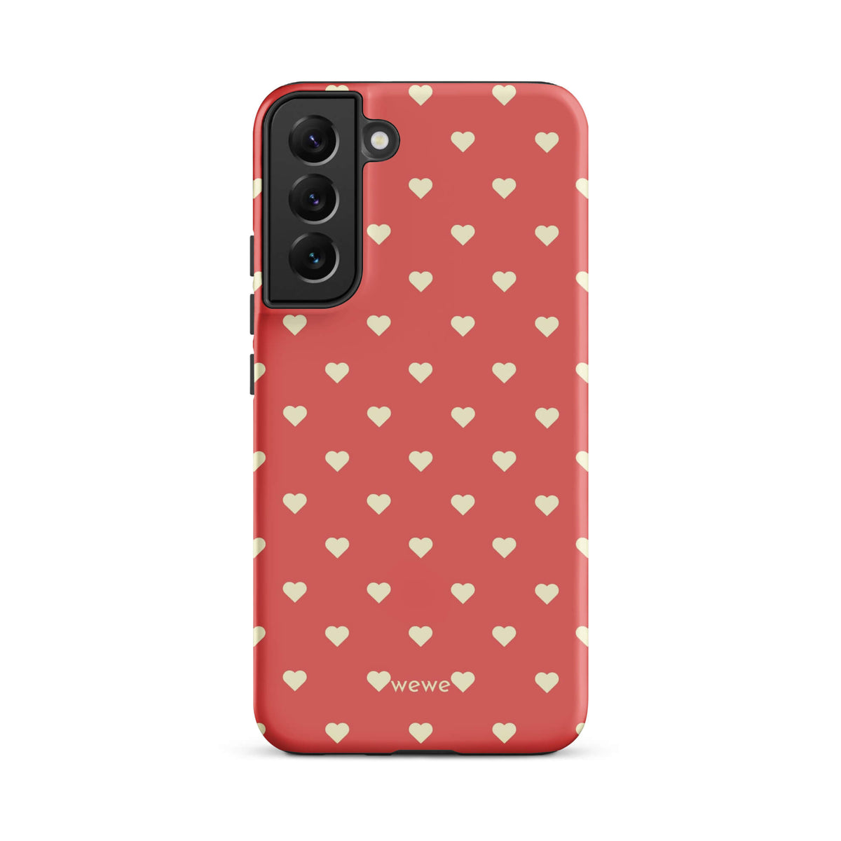 Coral-pink iPhone case with evenly spaced soft-cream mini hearts