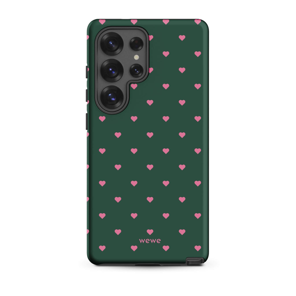 Deep forest-green iPhone case with evenly spaced vivid-pink mini hearts