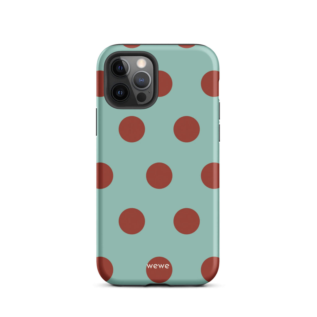 Custom iPhone case 12 pro with a light mint green background and a repeating pattern of evenly spaced maroon or deep red polka dots.