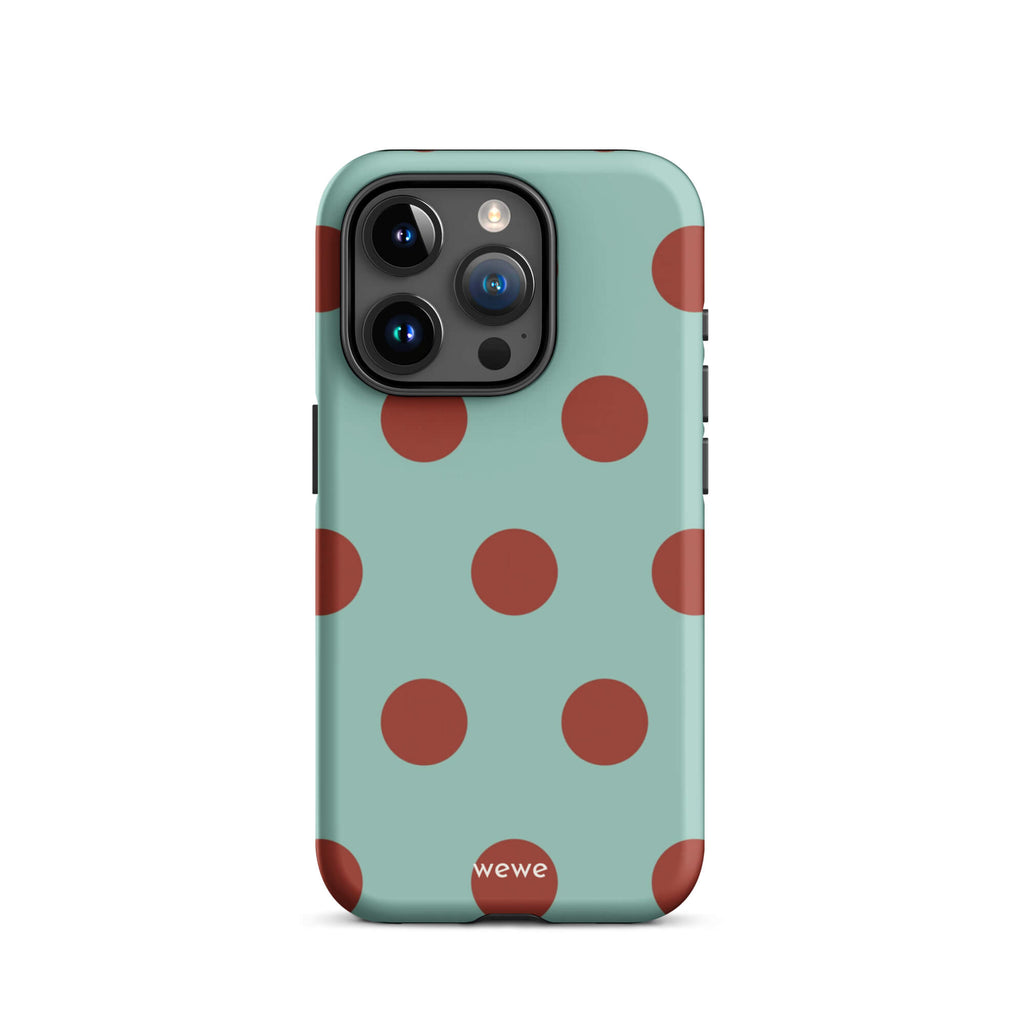 Custom iPhone case 15 pro with a light mint green background and a repeating pattern of evenly spaced maroon or deep red polka dots.