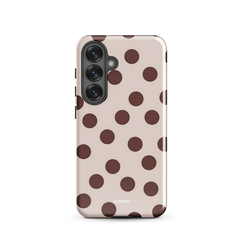 Custom samsung galaxy s25 tough case in matte light beige/taupe with large dark brown (mocha) polka dots and 'wewe' branding at the bottom.