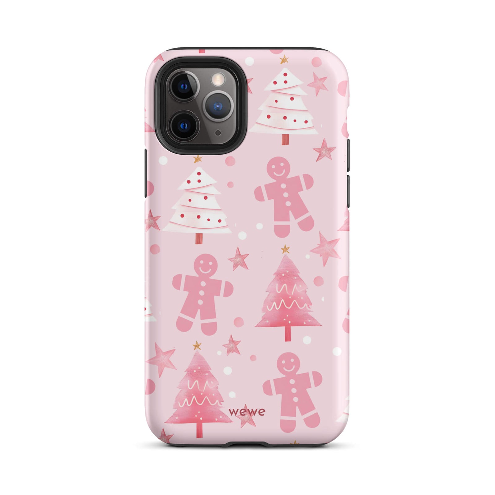 Custom iPhone 11 pro tough case featuring a soft pastel pink background with a scattered pattern of pink gingerbread men, pink and white Christmas trees, and watercolor pink stars, with 'wewe' branding at the bottom.