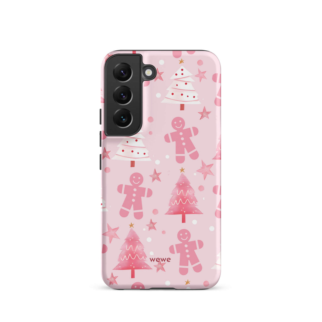 Custom samsung galaxy s22 tough case featuring a soft pastel pink background with a scattered pattern of pink gingerbread men, pink and white Christmas trees, and watercolor pink stars, with 'wewe' branding at the bottom.