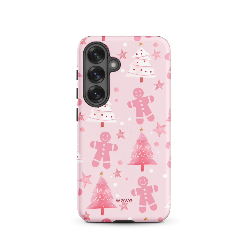 Custom samsung galaxy s25 tough case featuring a soft pastel pink background with a scattered pattern of pink gingerbread men, pink and white Christmas trees, and watercolor pink stars, with 'wewe' branding at the bottom.