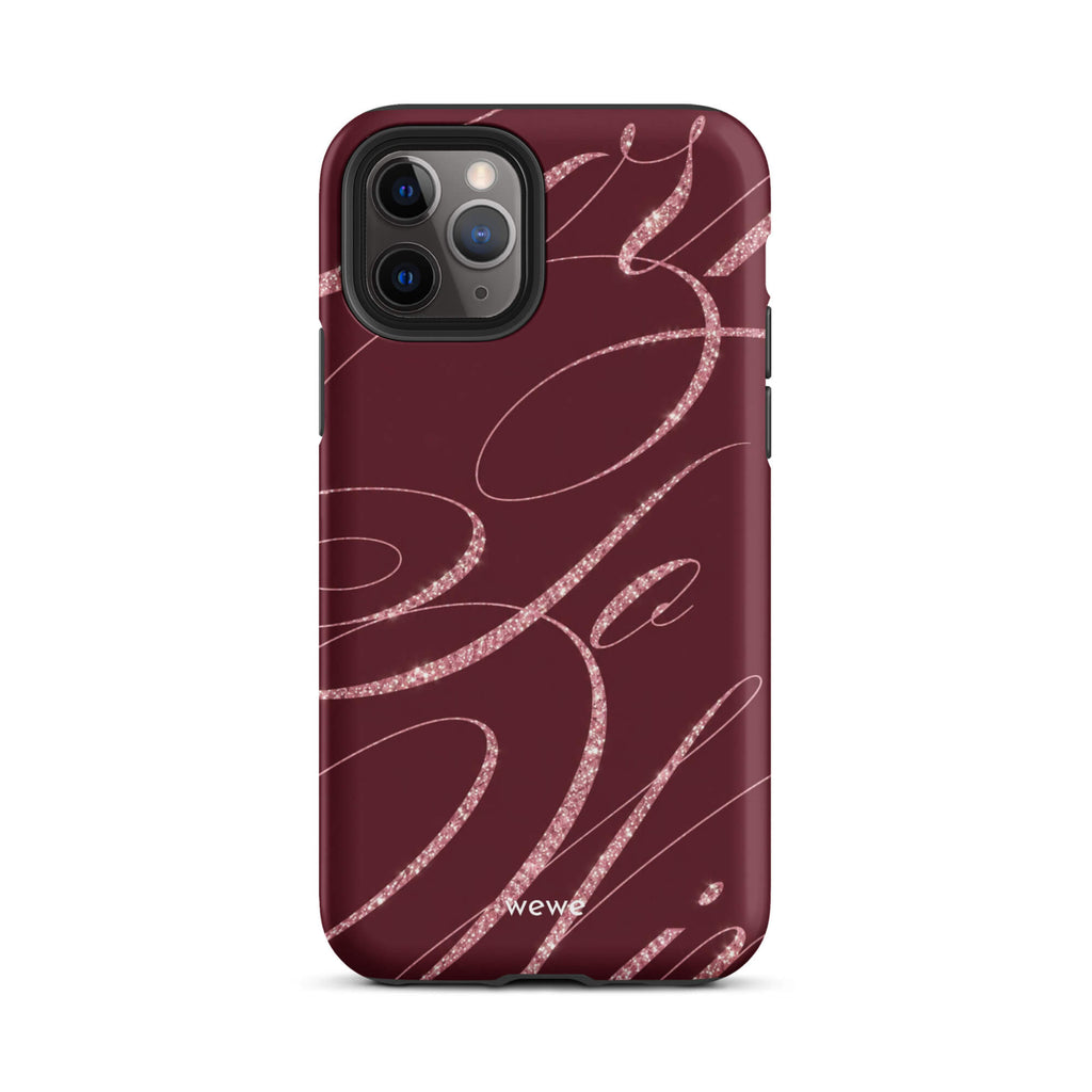 Deep burgundy iPhone case with flowing pink glitter-effect lines and looping abstract swirls