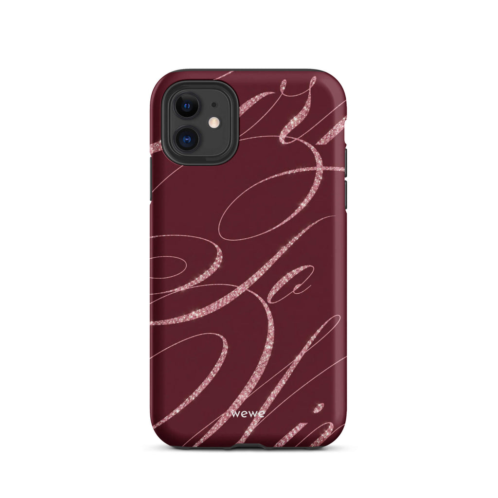 Deep burgundy iPhone case with flowing pink glitter-effect lines and looping abstract swirls