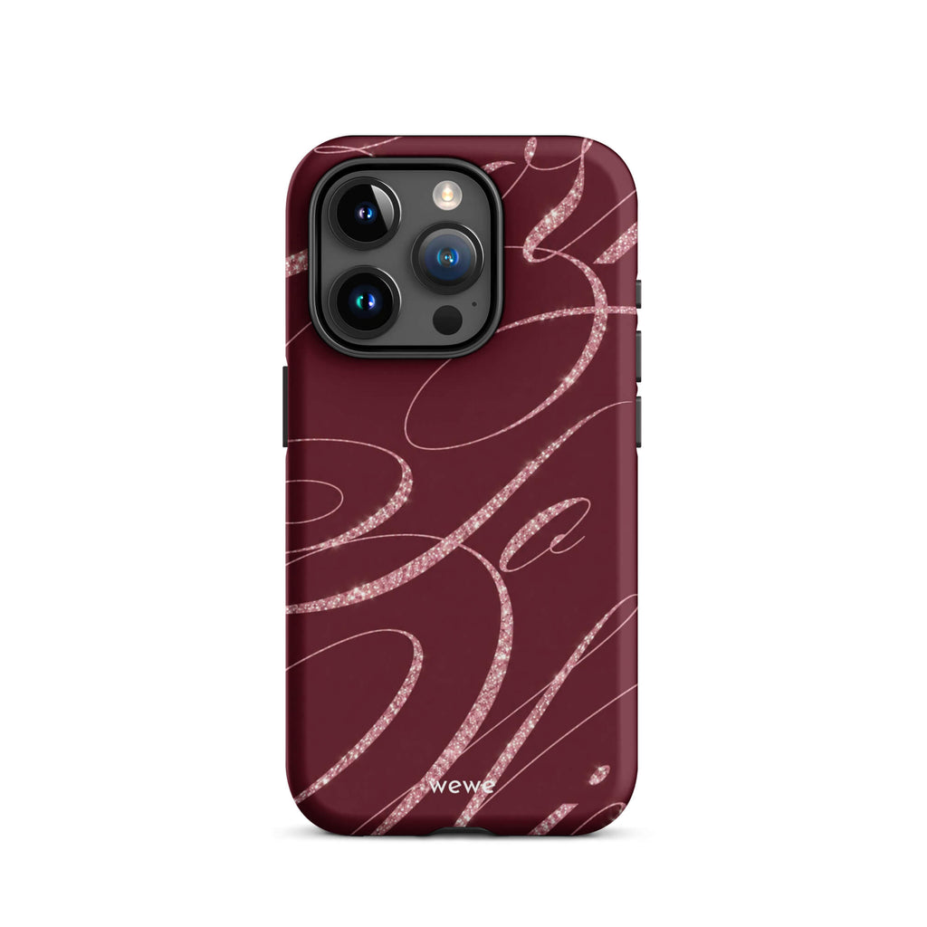 Deep burgundy iPhone case with flowing pink glitter-effect lines and looping abstract swirls