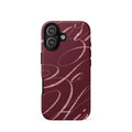 Deep burgundy iPhone case with flowing pink glitter-effect lines and looping abstract swirls