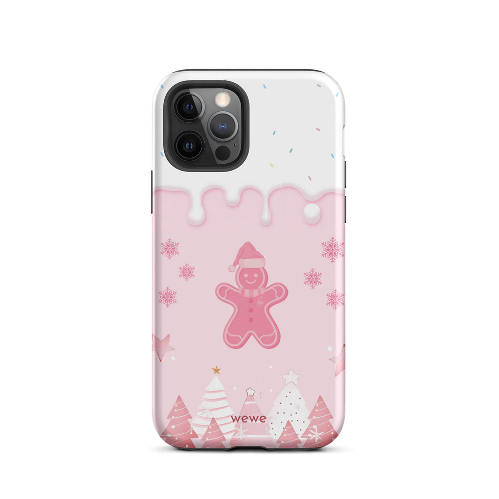 Custom iPhone 12 pro tough case featuring a white top panel with colorful sprinkles and a pink icing drip border, showcasing a cute gingerbread man wearing a Santa hat, surrounded by pink snowflakes and stylized pink/white Christmas trees, with 'wewe' branding at the bottom.