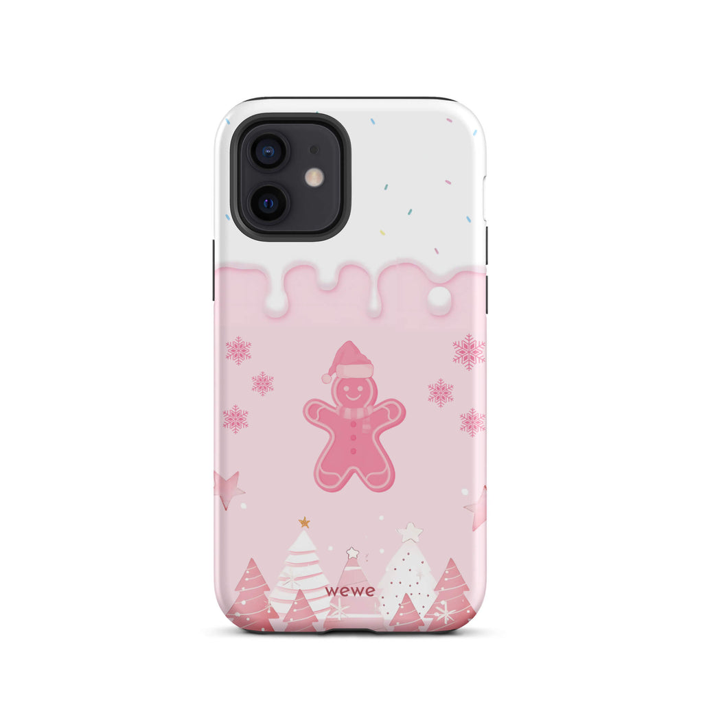 Custom iPhone 12 tough case featuring a white top panel with colorful sprinkles and a pink icing drip border, showcasing a cute gingerbread man wearing a Santa hat, surrounded by pink snowflakes and stylized pink/white Christmas trees, with 'wewe' branding at the bottom.
