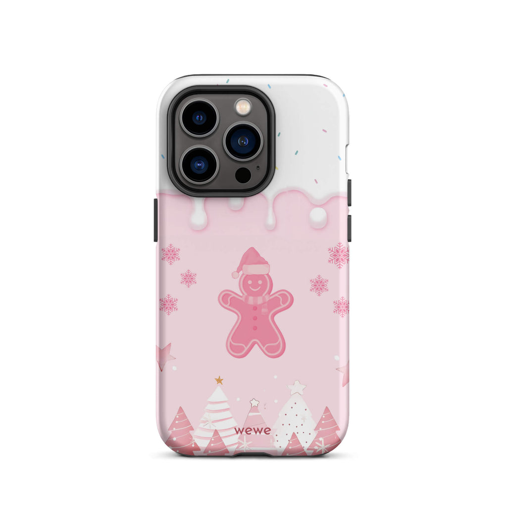 Custom iPhone 14 pro tough case featuring a white top panel with colorful sprinkles and a pink icing drip border, showcasing a cute gingerbread man wearing a Santa hat, surrounded by pink snowflakes and stylized pink/white Christmas trees, with 'wewe' branding at the bottom.