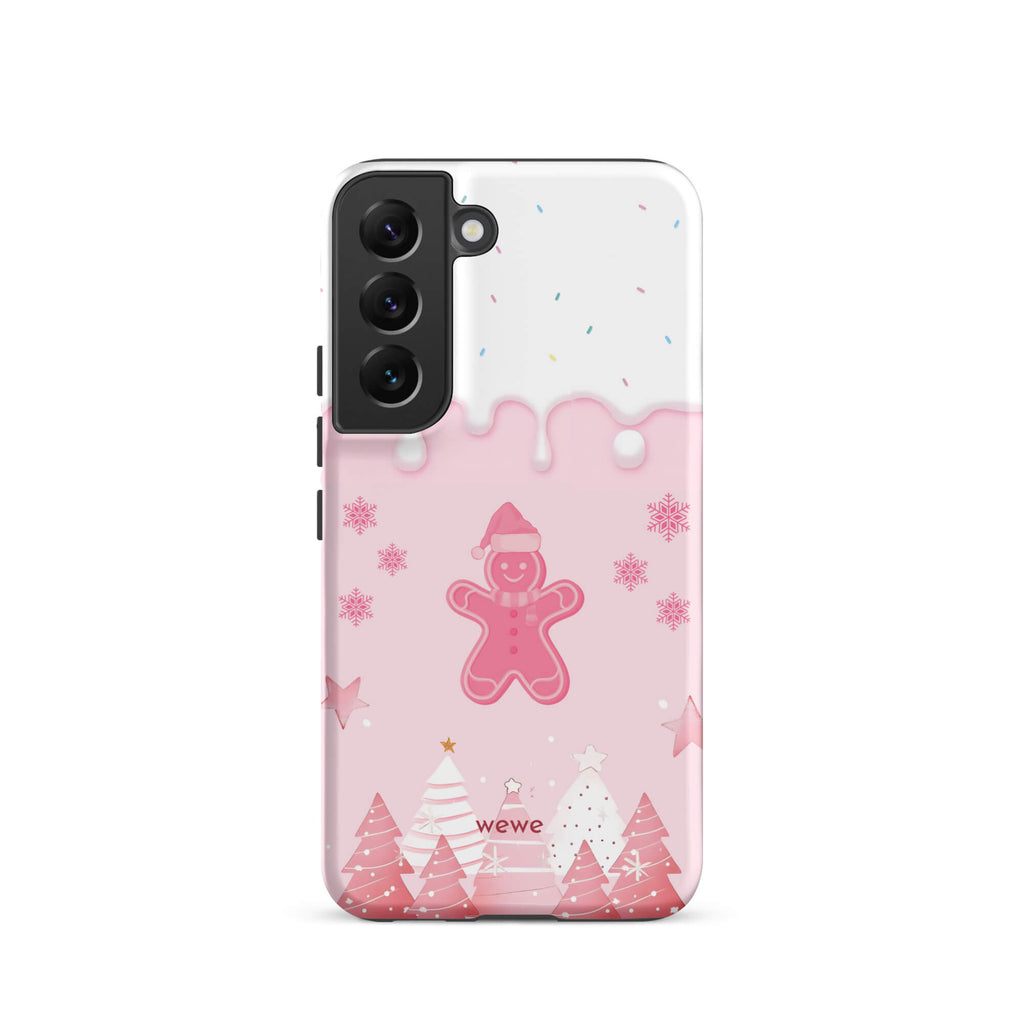 Custom samsung galaxy s22 tough case featuring a white top panel with colorful sprinkles and a pink icing drip border, showcasing a cute gingerbread man wearing a Santa hat, surrounded by pink snowflakes and stylized pink/white Christmas trees, with 'wewe' branding at the bottom.