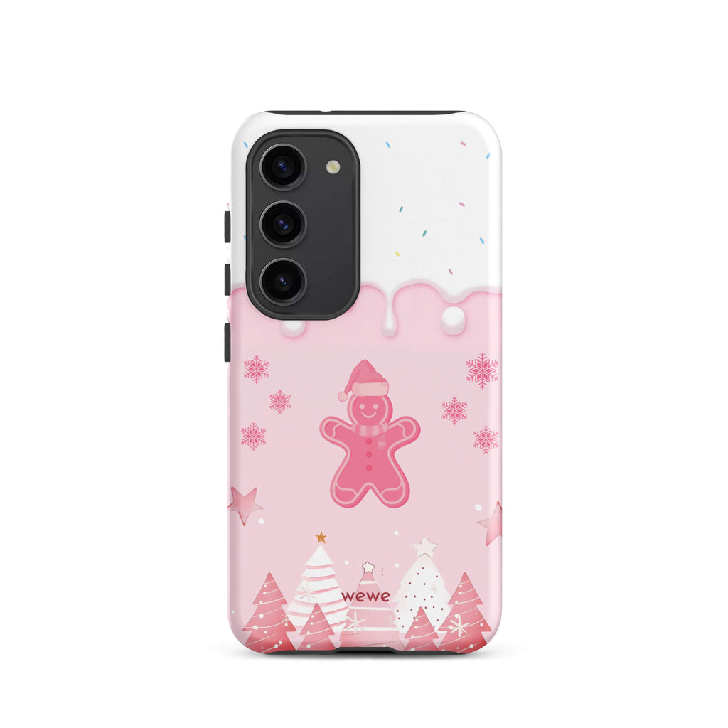 Custom samsung galaxy s23 tough case featuring a white top panel with colorful sprinkles and a pink icing drip border, showcasing a cute gingerbread man wearing a Santa hat, surrounded by pink snowflakes and stylized pink/white Christmas trees, with 'wewe' branding at the bottom.