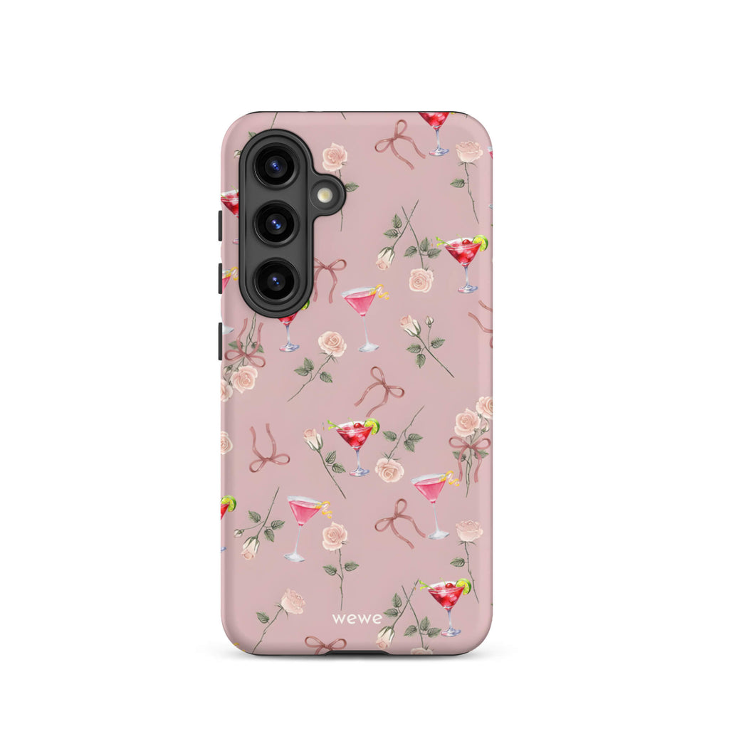 Custom samsung galaxy s24 Phone case with a repeating pattern of pink roses, ribbon bows, and red cocktail glasses on a light rose colour background.
