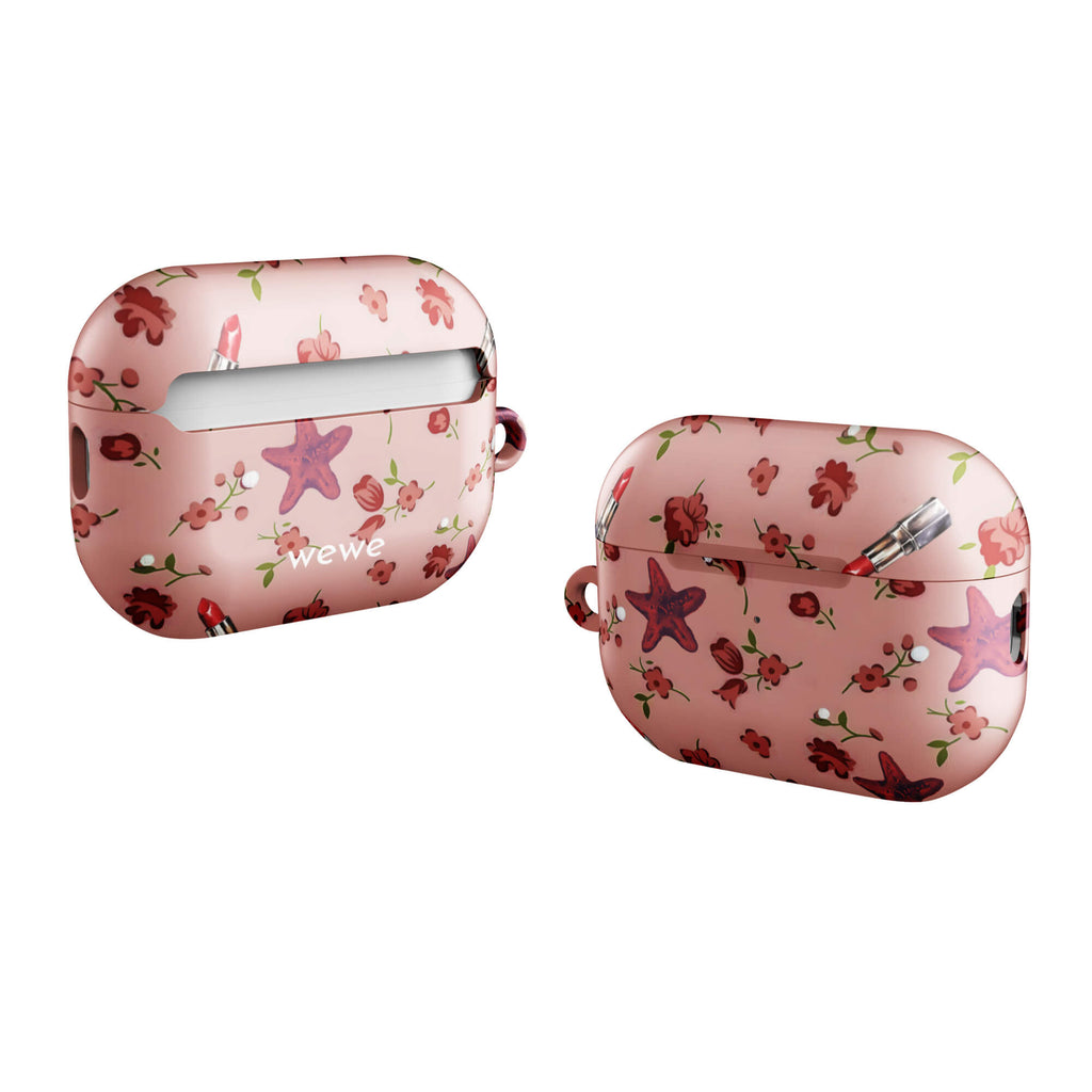 Custom airpods case pro gen2 with a  retro pattern of red flowers, starfish, and lipstick tubes on a pink rose colour background.